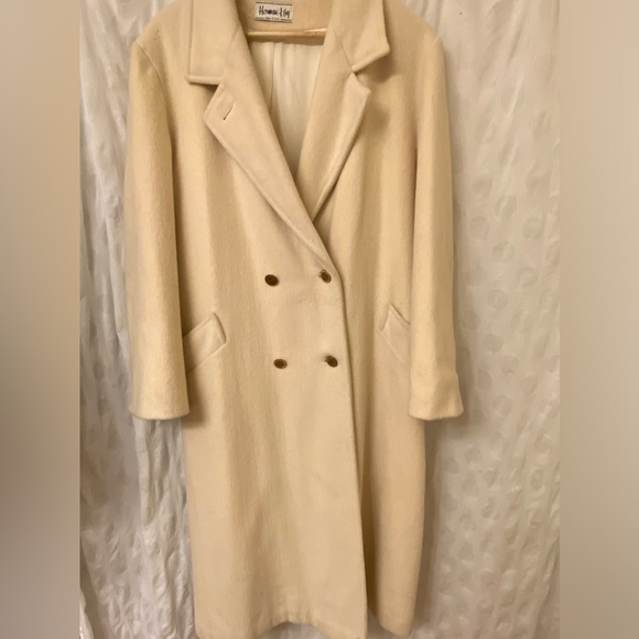 Rock your vintage lifestyle with this Herman Kay white wool coat.Size 14. - Picture 1 of 14